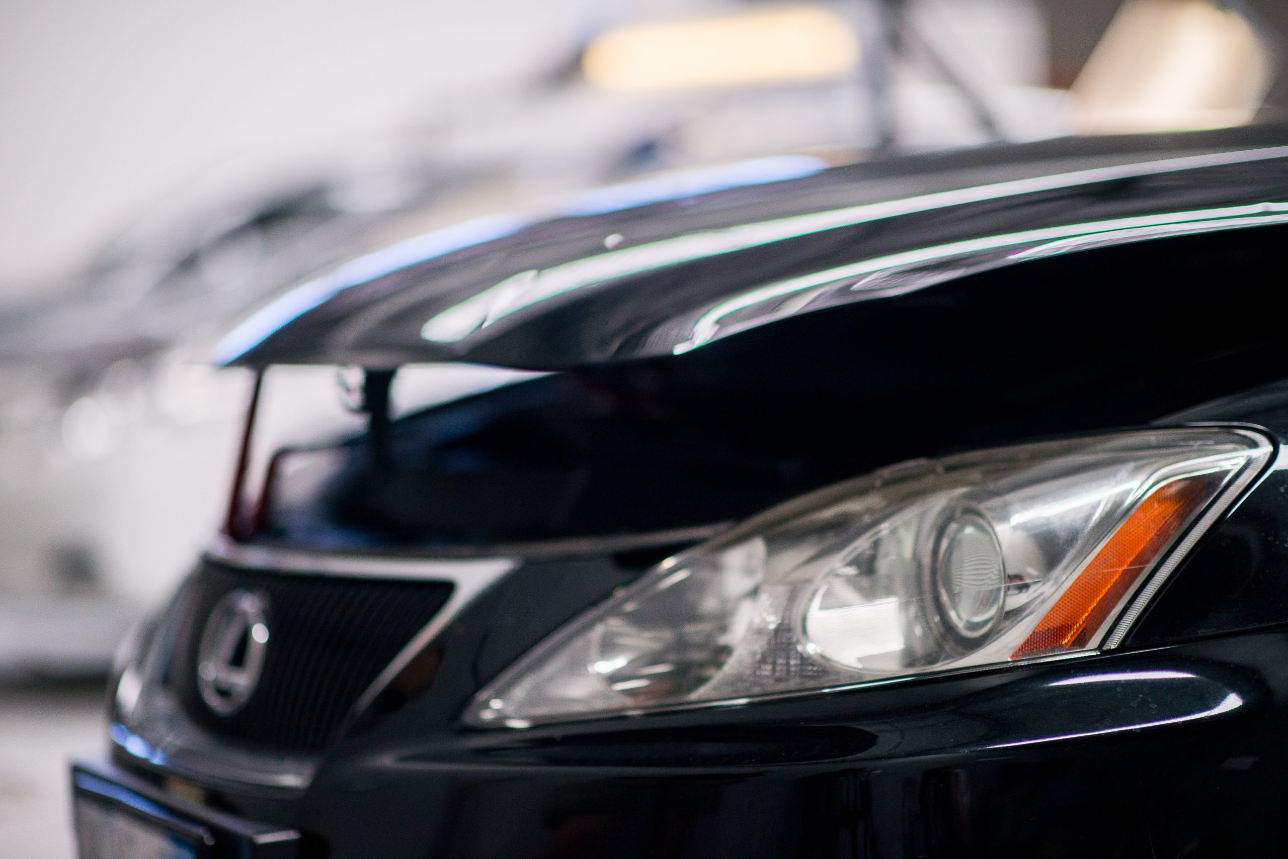 A vehicle undergoing repair in a United Hail Repairs workshop